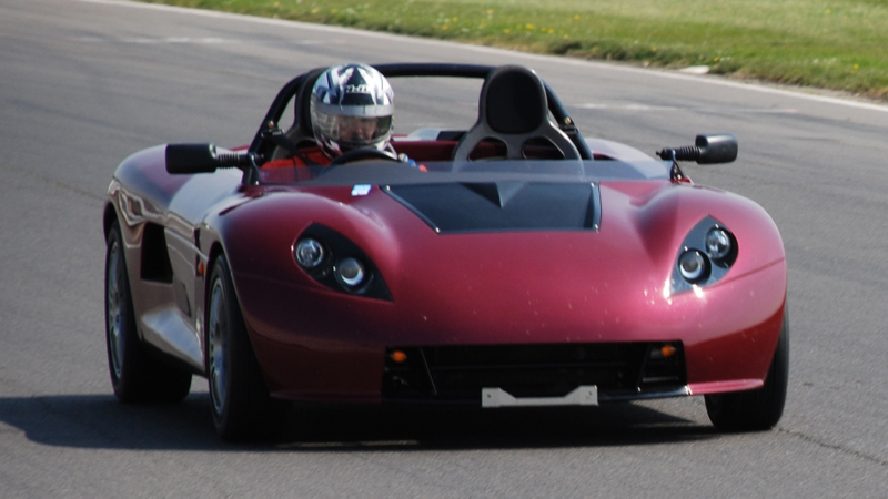Illustration for article titled Buy A Car Company And Start Making Mid-Engined Miatas, Sort Of